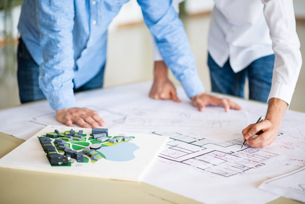 Grundriss und Stadtplan mit zwei Personen - csbt